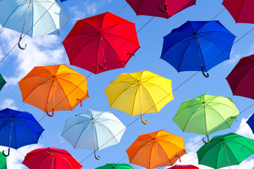 Fototapeta na wymiar colorful umbrellas on a sunny day