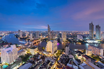 Scenic view curved of the Chao Phraya River in Bangkok city downtown during twilight, capital of Thailand.
