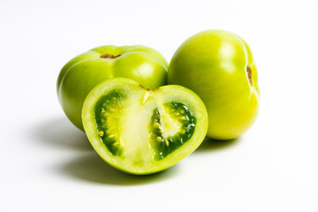 Green tomato on white background