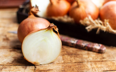 Onions on a rustic wooden table