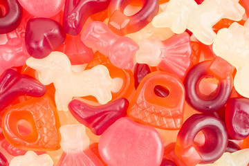 background of gummy candy with different fruit flavors