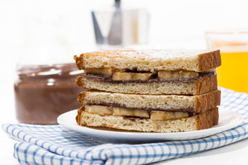 sweet breakfast - sandwich with chocolate paste and banana
