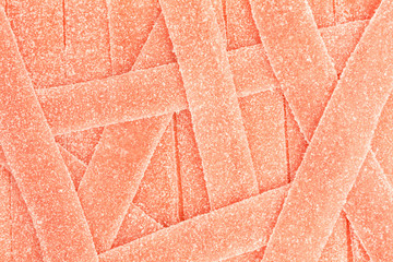 sugary red strawberry flavored gummy candy stripes