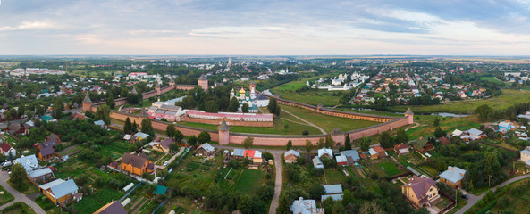 Scenic panoramic view of Suzdal, Russia. St Euthymius Monastery at the small river. Suzdal is a famous tourist attraction and part of the Golden Ring of Russia. Beautiful panorama of Suzdal in summer