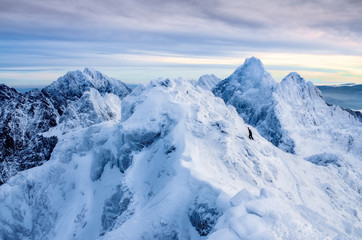Beautiful winter landscape with lonely climber and snowed mountains, Slovakia - 226370865