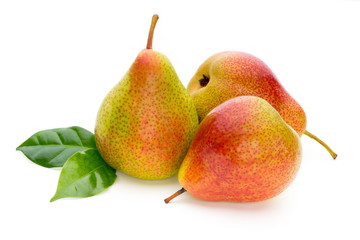 Fresh bio pear with leaves on isolated white background.