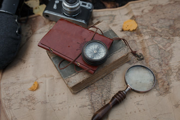 Fototapeta na wymiar Flatlay with travel things - map, flask, book, compass