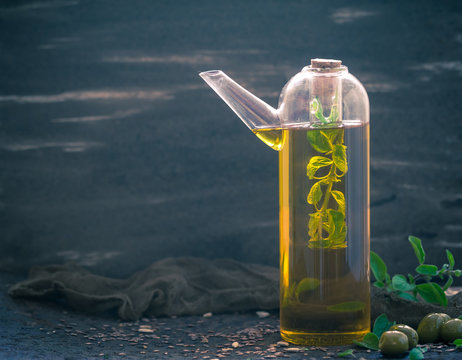 bottle filled olive oil addition sprigs herbs