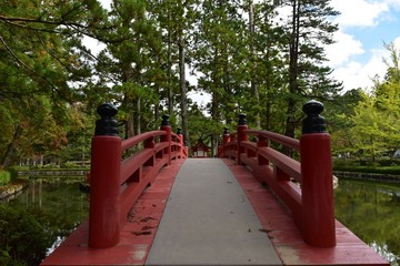 Pond and red bridge next to Koyasan middle gate