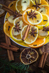 Fototapeta na wymiar Ingredients medicinal tea Citrus spices Slices lemon orange ginger cloves cinnamon