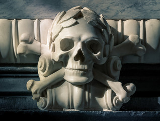 marble stone skull and bones sculpture