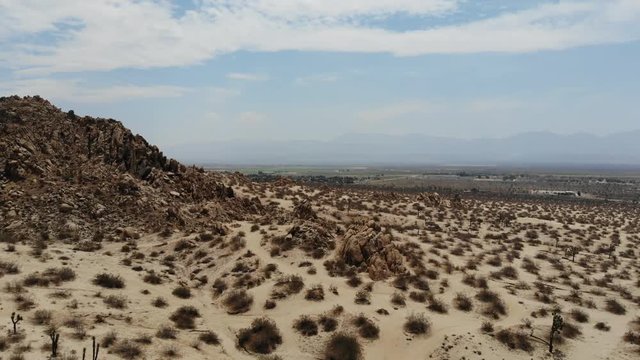 Aerial of Strang rock formations in the Desert of California.