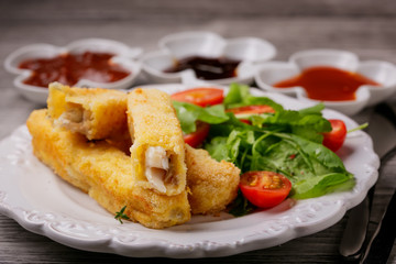 Fish sticks and sauces, top view