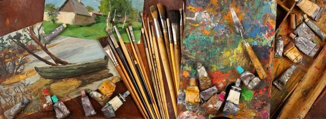 Panorama with sketches and tools of the working artist