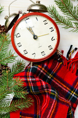 Christmas background with a clock and Christmas tree with a place for the text. Xmas greeting card.