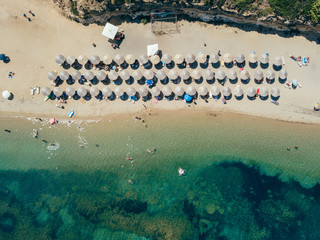 Beach with sun beds, view from above