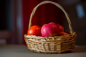 fresh Fruits and vegetables are in a wicker basket