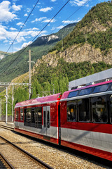Naklejka premium Train Waiting at Swiss Railway Station
