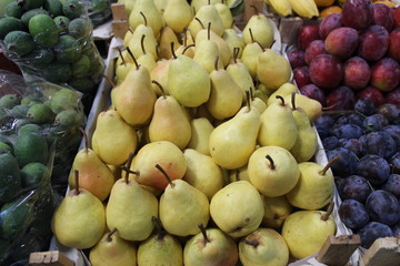 Fresh pears grouped at market
