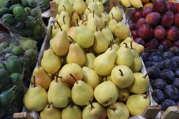 Fresh pears grouped at market