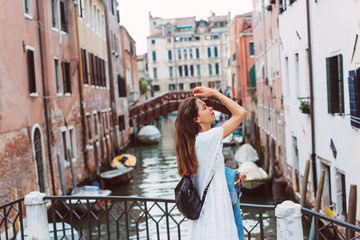 young girl walks the streets of Venice