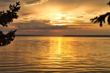 The sun setting over Waskesiu Lake in Prince Albert National Park of Canada.