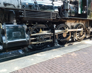 Steam Locomotive Warming up a Train Station