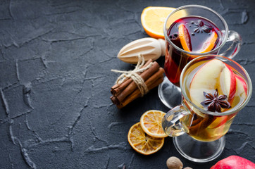 Two glasses of different type of mulled wine