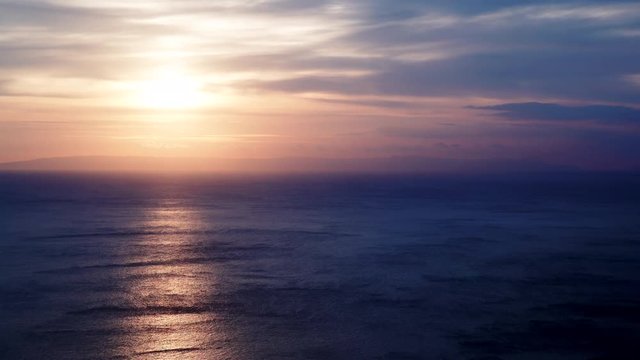 Scenic sunrise sun rising over sea surface, Greece Peloponnese, time lapse