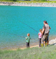 happy family fishing together 