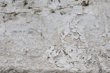 Old white grunge wall background or texture.