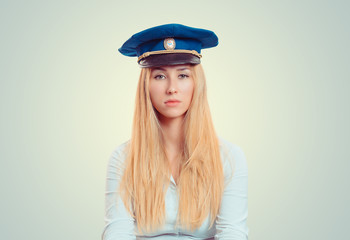 Serious woman in forage cap