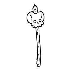 black and white cartoon skull on spike