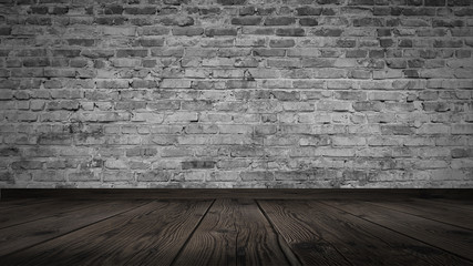cellar, lit by a searchlight. Brick white wall and wooden floor