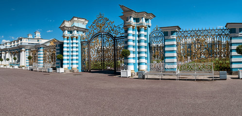Panorama of the entrance gate with columns of the Eterininsky Park in Tsarskoye Selo in St. Petersburg