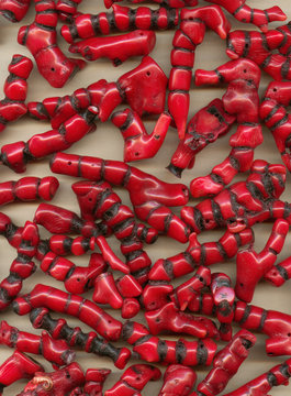 Natural red with black corals background. A lot of corals. Coral texture. Precious coral. Corallium rubrum.