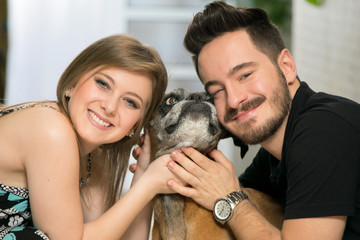 young couple with their dog