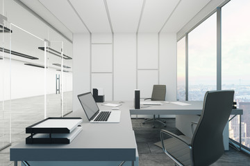 Contemporary office with empty laptop