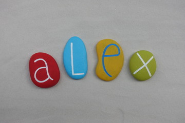 Alex, given name with colored stones over white sand