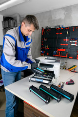 master professional refills laser printer cartridges in the workshop