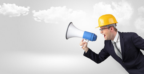 Young supervisor architect yelling to far big city panorama
