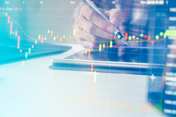 Double exposure business people working at office. Stock markets financial or Investment strategy background Business chart concept