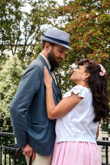 Couple in love in a park of Paris Montmartre