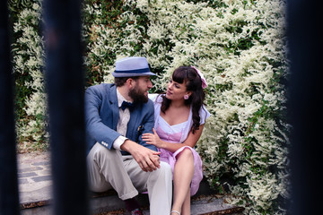 Couple sitting in the stairs of Montmartre in love
