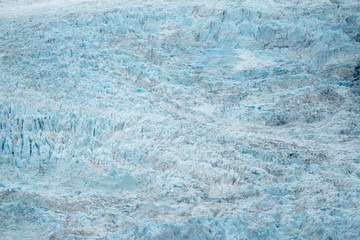 Close up view of teal blue colored Holgate Glacier in Alaska's Kenai Fjords National Park