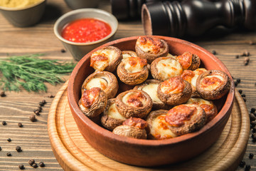 mushrooms stuffed with cheese on a plate