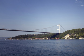 View of FSM bridge on Bosphorus and Asian side in Istanbul. It is a sunny summer day.