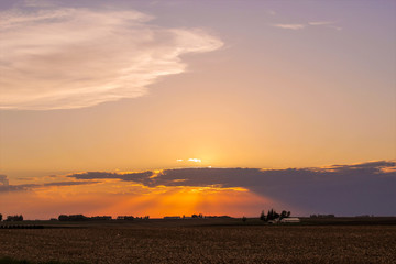Fototapeta na wymiar clouds over a rural American field in Iowa