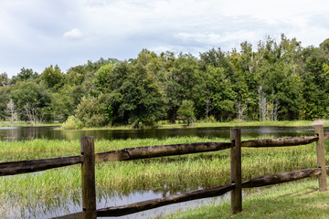 rural landscape with wooden fence