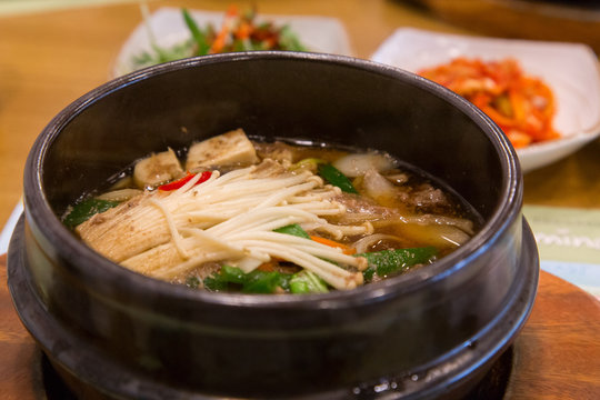 A bowl of Bulgogi, Korean local dish that has beef, mushrooms, kimchi and other vegetables.